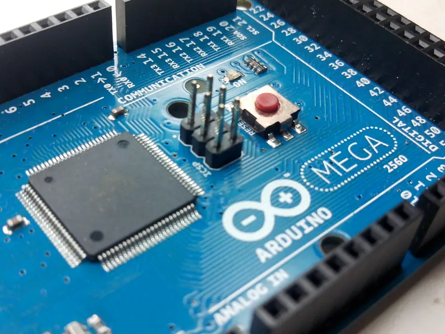 Arduino Mega 2560 microcontroller board and pin headers